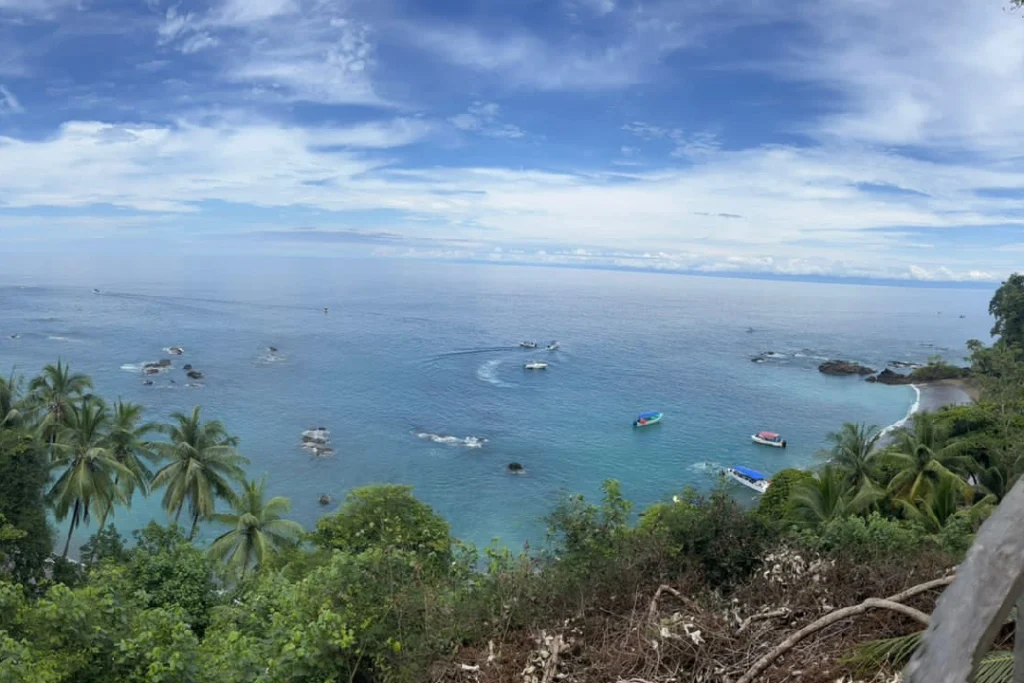 Coastal lookout over the Osa Peninsula with boats in the bay