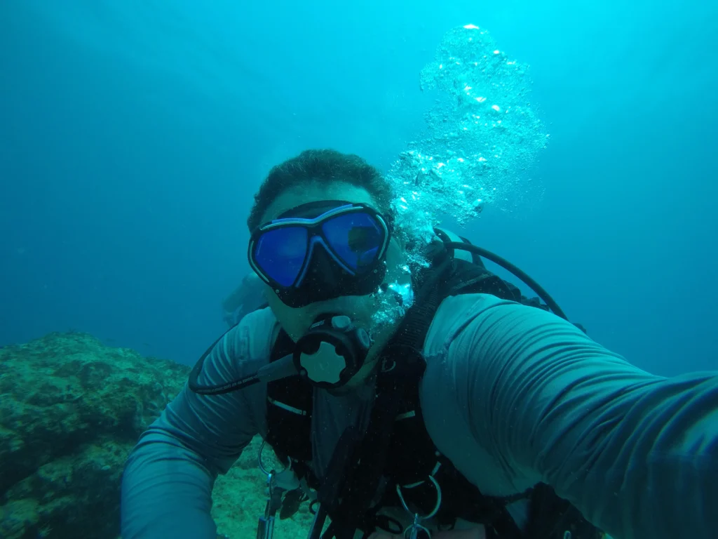 Scuba diver taking an underwater selfie at Caño Island